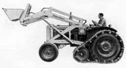 Str&ouml;msholmen Tran&aring;s loader mounted on a tractor with half-track equipment